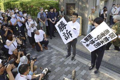 Japan's court recognizes more victims of Minamata mercury poisoning and awards them compensation