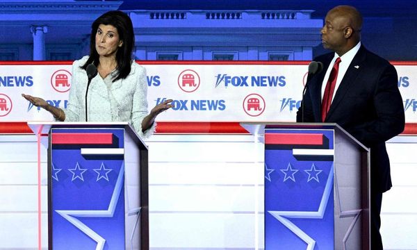 Crosstalk and weak zingers hand win to absent Trump at Republican debate
