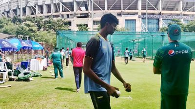 Six feet nine inches tall, net bowler Nishanth Saranu stands out in Pakistan training session