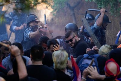 Lebanese Armenians scuffle with riot police during protest outside Azerbaijan Embassy