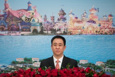 Evergrande spirals even further after halting its shares and admitting its billionaire chairman is detained due to 'suspicion of illegal crimes'