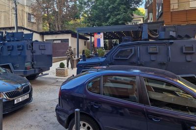 Kosovo police conduct raids in Serb-dominated north following clashes that left 4 dead on weekend