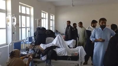 Twin blasts near Pakistan mosques on religious holiday kill dozens