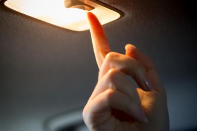 Is it illegal to drive with your car's inside lights on?