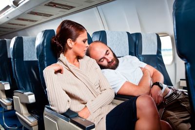 The most annoying habits when flying, from hogging arm rests to holding up security queues