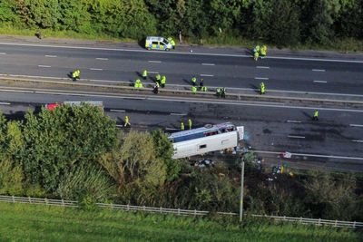 Girl, 14, and school bus driver die following motorway crash