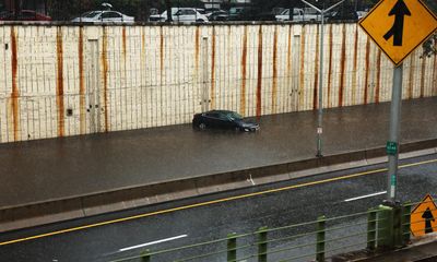New York mayor dismisses claims he was slow to react as heavy rain causes major flooding – as it happened