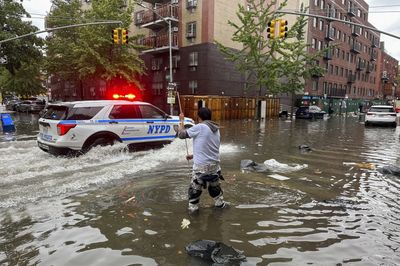 New York swamped by record-breaking rainfall as more downpours expected Saturday