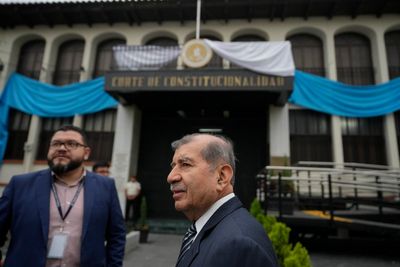 Police scuffle with electoral court justices in Guatemala as prosecutors seek to seize vote tallies