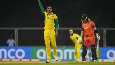 Cricket World Cup warm-up match | Starc steals the show with a hat-trick in rain-hit match against Netherlands