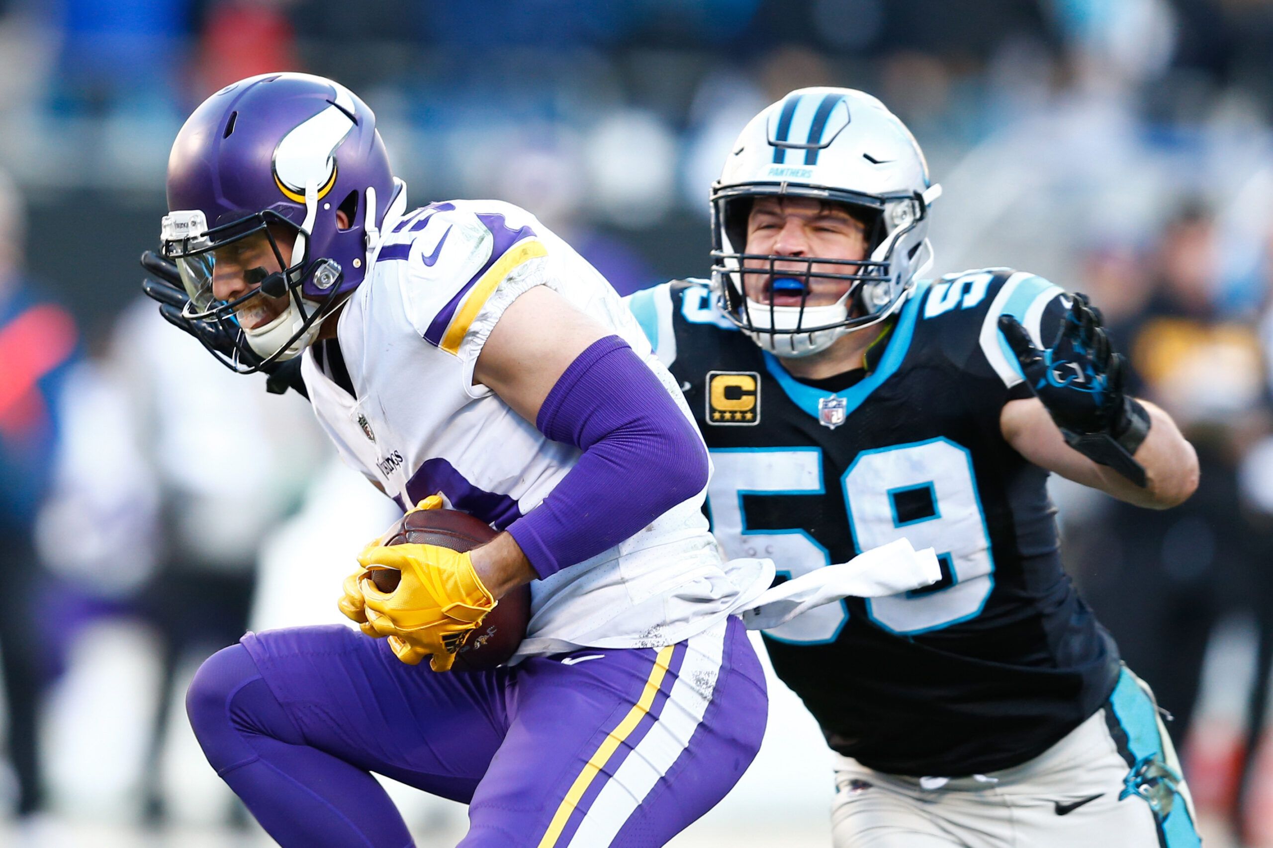 Carolina Panthers running back Jonathan Stewart, left, and full back Mike  Tolbert, right, watch as running back Brand…