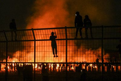 Anger and despair as Indonesian families mark year since football disaster