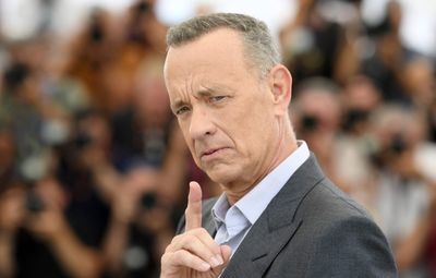 Tom Hanks, a longtime critic of using AI in film and TV, warns fans about a dental plan video using a deepfake AI version of him: ‘We saw this coming’