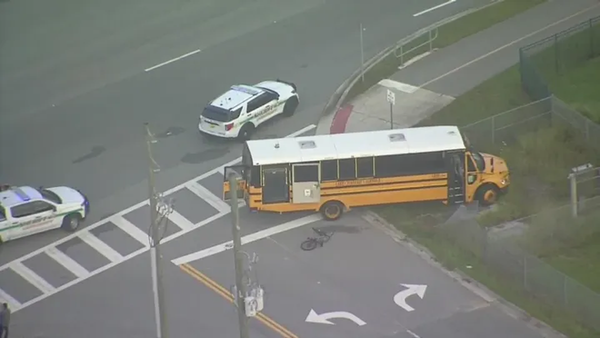 Teen is struck and killed by school bus on crosswalk steps from campus