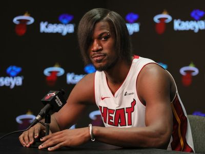 NBA superstar Jimmy Butler debuts hilarious new look for Miami Heat media day