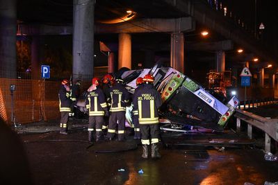 At least 21 dead after passenger bus plunges off overpass near Venice