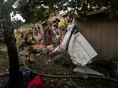 Two dead and one critically injured after plane crashes into Oregon home