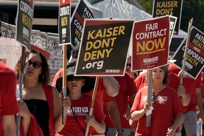 Kaiser hospital strike begins with 75,000 workers joining picket lines across the US