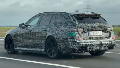 BMW M5 Touring Wagon Spied Cruising The Autobahn In Full Camouflage Wrap