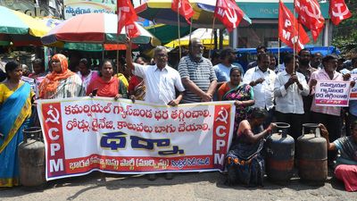 Hawkers in Vijayawada demand road repairs and slashing of gas cylinder prices