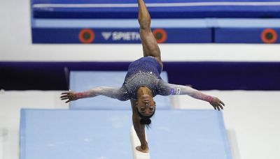 Simone Biles leads U.S. women gymnastics team to title at world championships