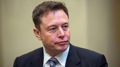 Dow Jones Dips; Elon Musk Says This Amid SEC Lawsuit; Fed Official Speaks Out On Yields