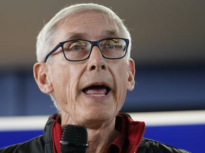 An armed man demanding to talk to Wisconsin's governor was arrested twice in one day