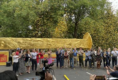 43 foot golden spike monument traveling from Lexington to Utah