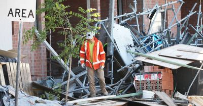 Clean up begins at construction site after scaffolding collapse