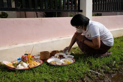 A modest Buddhist ceremony marks the anniversary of a day care center massacre in Thailand