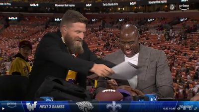 Fanboy Ryan Fitzpatrick brought an absurd amount of merch for Magic Johnson to sign