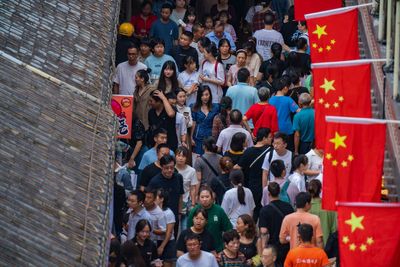 China's flagging economy gets a temporary boost as holiday travel returns to pre-pandemic levels