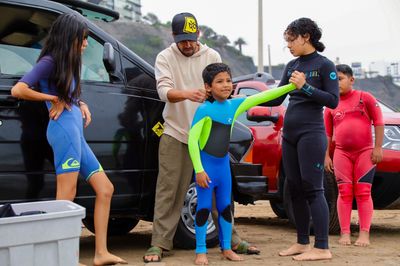 For these Peruvian kids, surfing isn't just water play