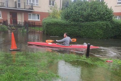 Glasgow man ‘trapped in own home’ uses kayak to access the road