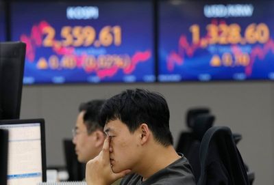 Stock market today: Asian markets are mixed, oil prices jump and Israel moves to prop up the shekel