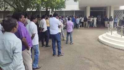Teaching, non-teaching associations of Madurai Kamaraj University stage demonstration over unpaid salaries