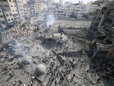 Israel unleashes attacks on Gaza as Hamas threatens hostages' lives