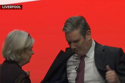Keir Starmer showered in glitter by protester as he begins conference speech