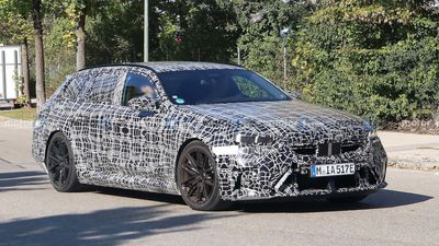 BMW M5 Touring Spied Wearing Less Camouflage Than Ever Before