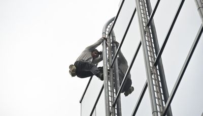 Anti-abortion activist climbs Accenture Tower, gets arrested