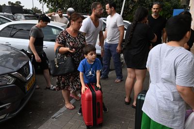 At a rest stop near Hamas attack sites, Israelis rush to help families and soldiers