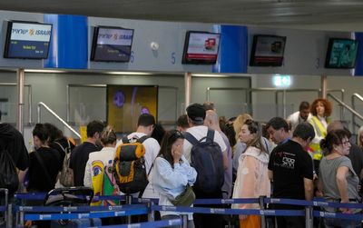 Some Israelis abroad desperately try to head home — to join reserve military units, or just to help