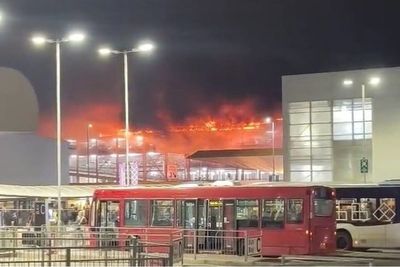 Luton Airport closed as fire rips through car park