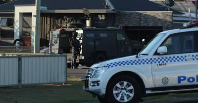 Eyewitness watches operation unfold as tactical team surrounds house