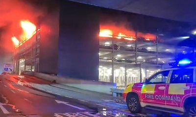 Flights begin taking off from Luton airport again after fire, as officials suggest blaze accidental – as it happened