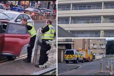 Police with 'riot shields' called to block of flats in Scottish town