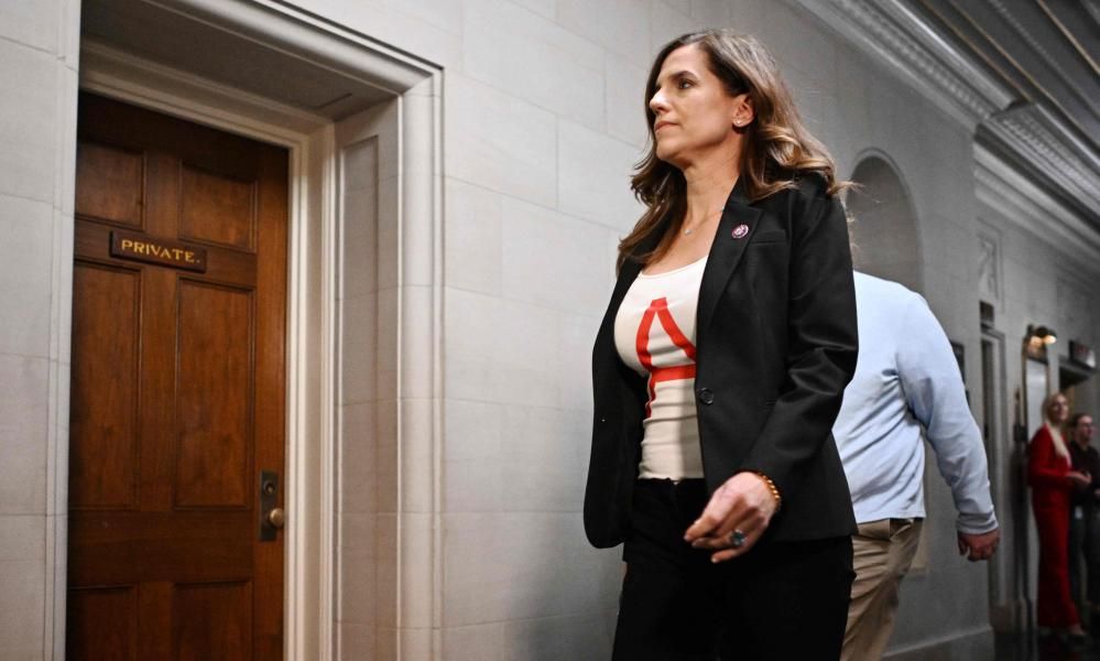 Key Republican wears scarlet ‘A’ T-shirt after vote to…