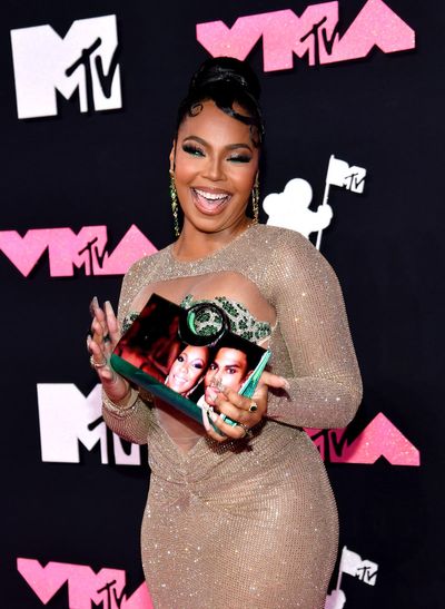 Nelly responds to Ashanti’s poignant accessory featuring their picture