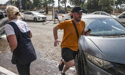 ‘Together we will win’: Israelis fearful but defiant in face of uncertainty