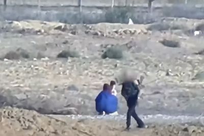 Hamas video appears to show release of woman, two children